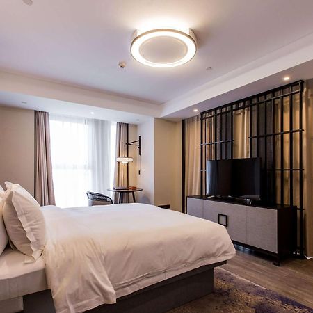 Howard Johnson By Wyndham Life Zhuoyuan Ningbo Exteriör bild