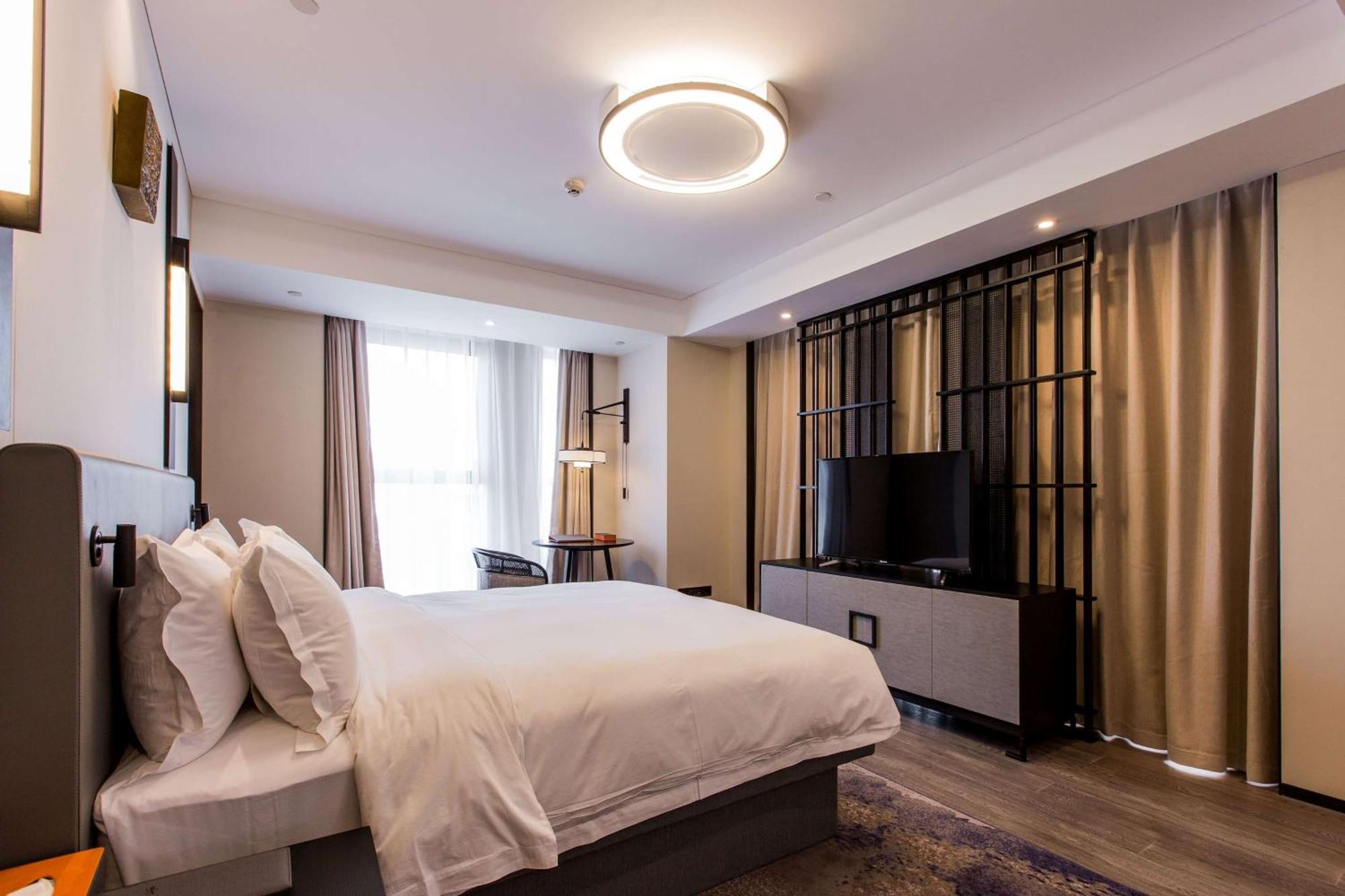 Howard Johnson By Wyndham Life Zhuoyuan Ningbo Exteriör bild